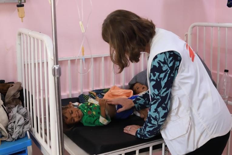 MSF membre avec un enfant