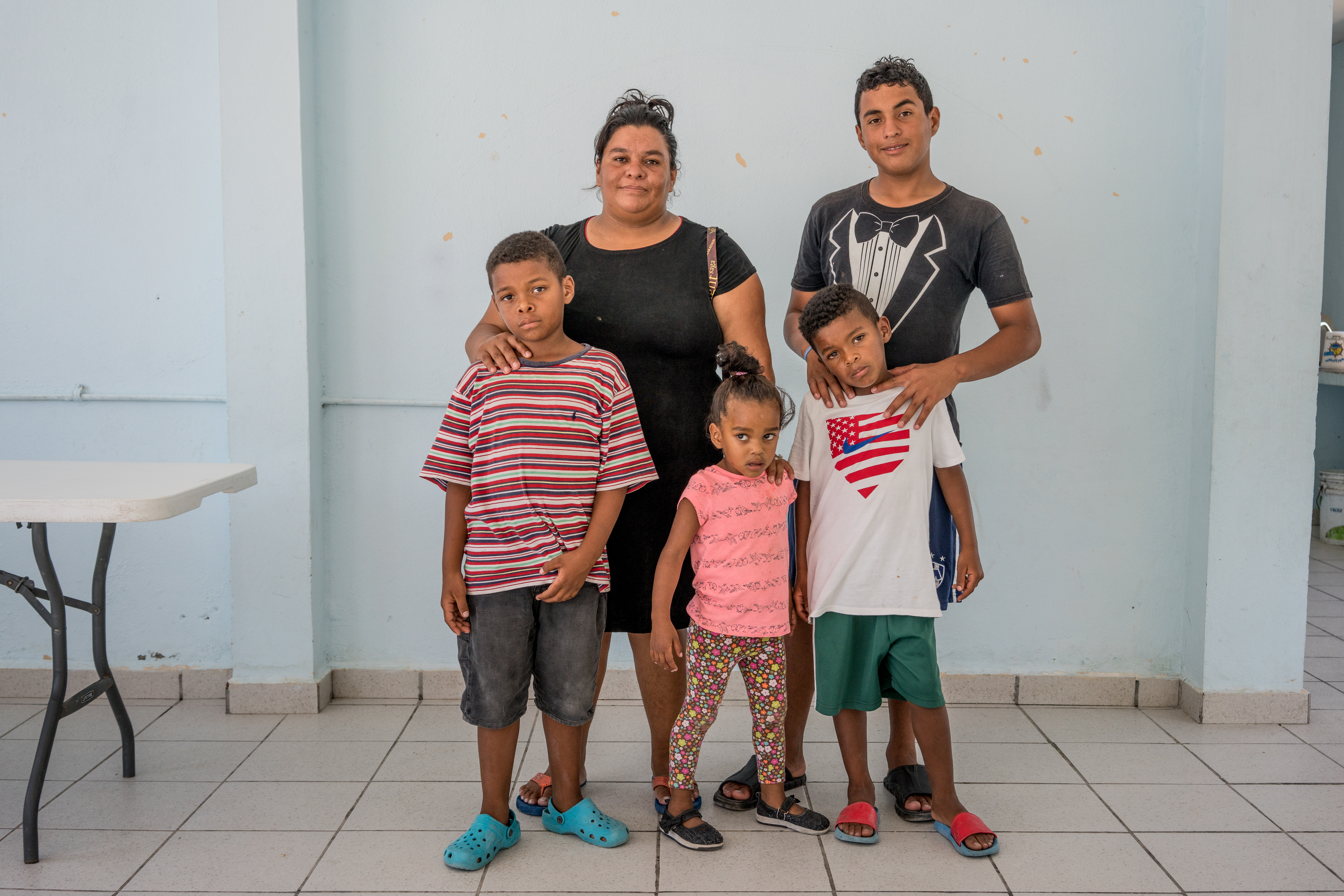Piedad en haar kinderen in het centrum van Senda de Vida in Reynosa, Mexico. ©  Dominic Bracco, mei 2017.
